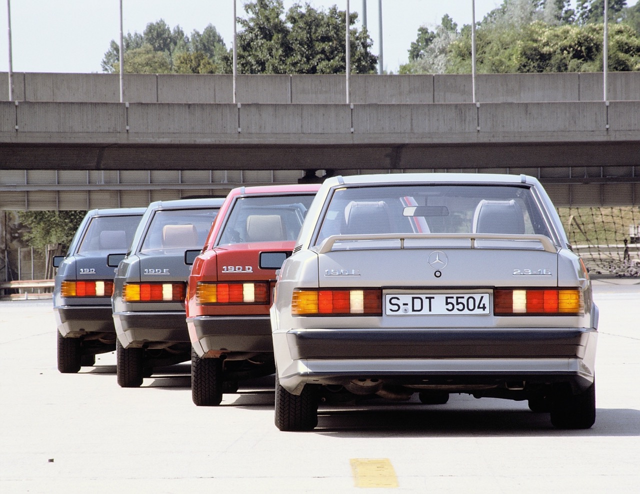 A lineup of various 190E models with differing performance
